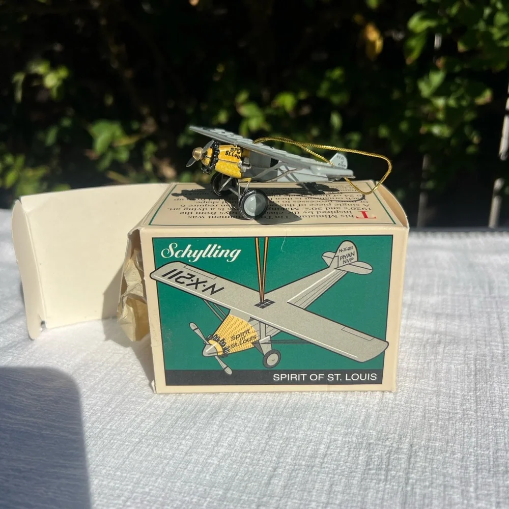 Vintage Schylling Tin Toy Spirit of St. Louis Airplane Metal Christmas Ornament.